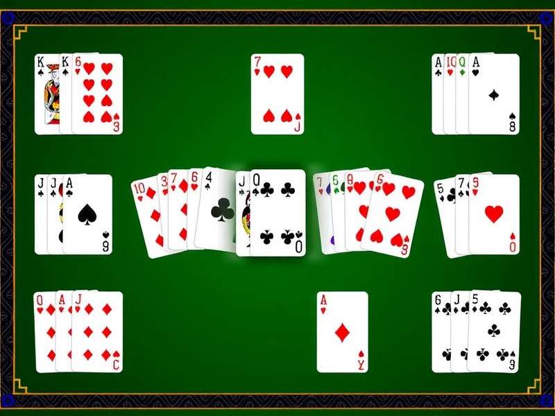 FreeCell game layout showing cascading cards with four free cells and foundations